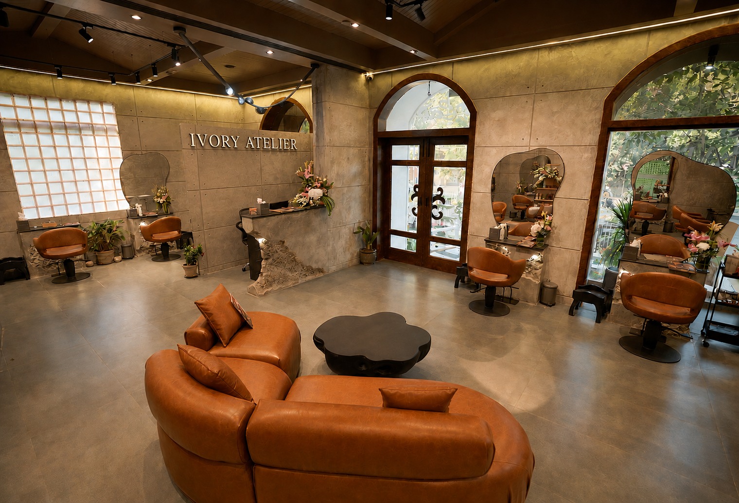 Ivory Atelier interior - arched corridors, marble floors, warm brass fixtures.